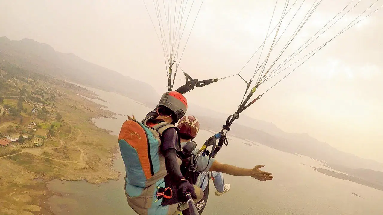 ​Experience paragliding over Pawna Lake near Mumbai 