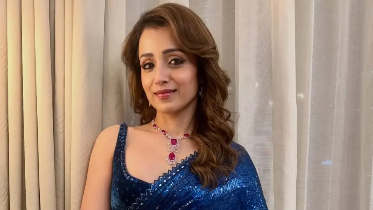 Trisha takes a jibe at Karuppu makers over alleged neglect 